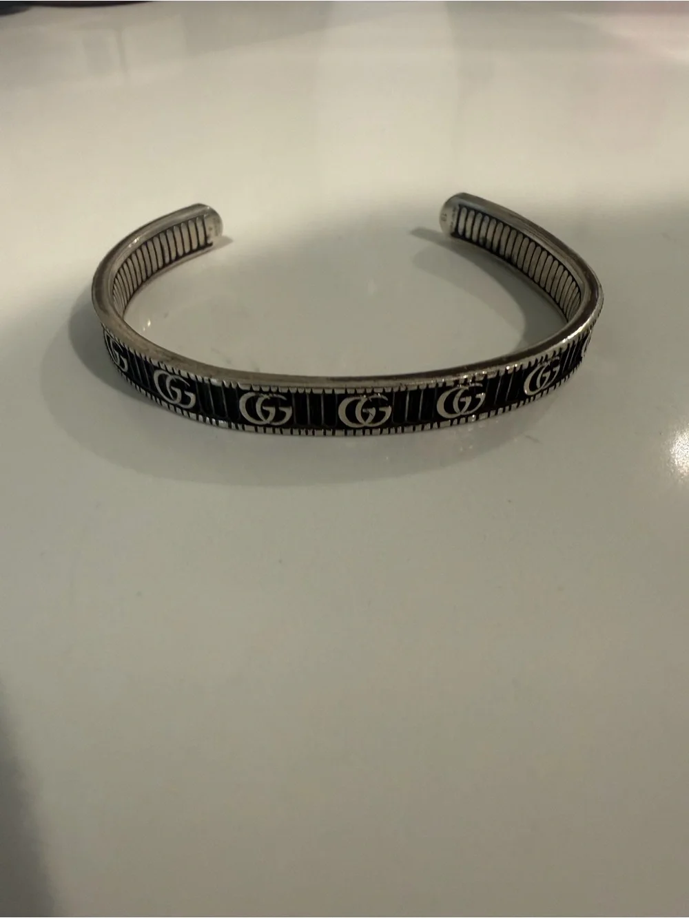 Gucci Silver and Black Signature GG Cuff Bracelet